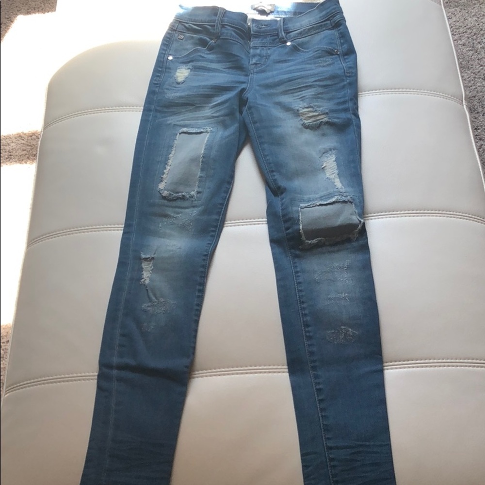 Bebé patched skinny jeans